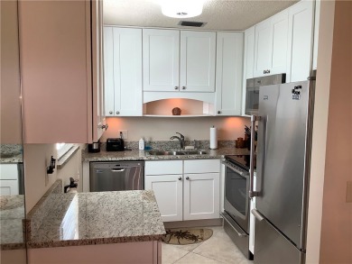 Totally updated first floor condo in active 55+ community with on Vero Beach South Golf Course in Florida - for sale on GolfHomes.com, golf home, golf lot