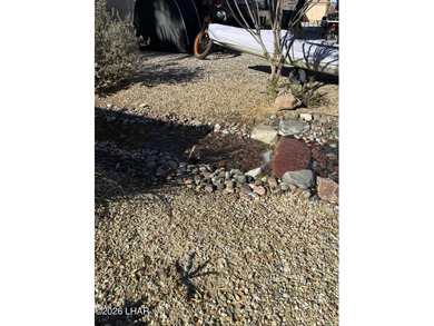 Large lot & beautiful area has babbling brook on the rear. Lot on The Refuge Golf and Country Club in Arizona - for sale on GolfHomes.com, golf home, golf lot