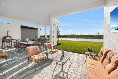 Beautiful Professionally Decorated.  This View Is Uninstructed on The Golf Club At Fiddlers Creek in Florida - for sale on GolfHomes.com, golf home, golf lot