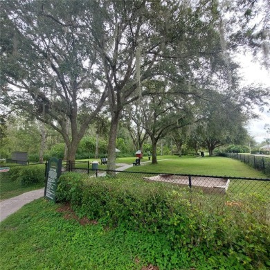 Move-in ready, 3br/2ba courtyard-style home built by Florida on The Groves Golf and Country Club in Florida - for sale on GolfHomes.com, golf home, golf lot