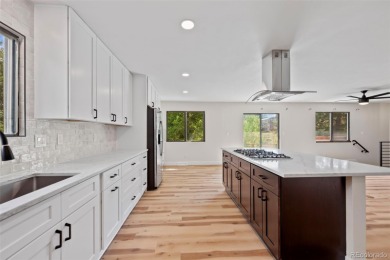 This home features an open concept kitchen that's perfect for on Pinery Golf and Country Club in Colorado - for sale on GolfHomes.com, golf home, golf lot