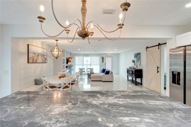 Modern charm meets timeless elegance in this fully renovated 3/2 on Vero Beach Country Club in Florida - for sale on GolfHomes.com, golf home, golf lot