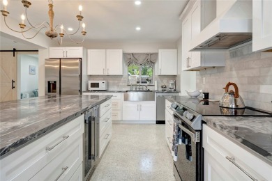 Modern charm meets timeless elegance in this fully renovated 3/2 on Vero Beach Country Club in Florida - for sale on GolfHomes.com, golf home, golf lot