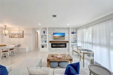 Modern charm meets timeless elegance in this fully renovated 3/2 on Vero Beach Country Club in Florida - for sale on GolfHomes.com, golf home, golf lot
