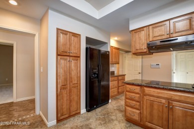 Discover comfort in this stunning 1,831 sq. ft. single-level on Antelope Hills Golf Courses in Arizona - for sale on GolfHomes.com, golf home, golf lot