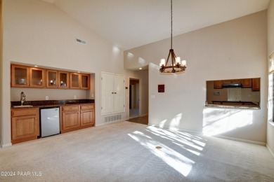 Discover comfort in this stunning 1,831 sq. ft. single-level on Antelope Hills Golf Courses in Arizona - for sale on GolfHomes.com, golf home, golf lot