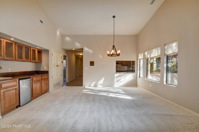 Discover comfort in this stunning 1,831 sq. ft. single-level on Antelope Hills Golf Courses in Arizona - for sale on GolfHomes.com, golf home, golf lot