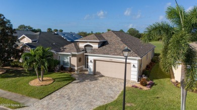 This meticulously maintained home offers stunning golf course on Viera East Golf Club in Florida - for sale on GolfHomes.com, golf home, golf lot