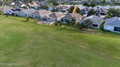 This meticulously maintained home offers stunning golf course on Viera East Golf Club in Florida - for sale on GolfHomes.com, golf home, golf lot