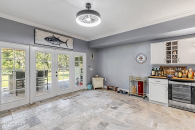 Canal-front gem is a rare find that promises the lifestyle on Hidden Lakes Golf Club in Florida - for sale on GolfHomes.com, golf home, golf lot