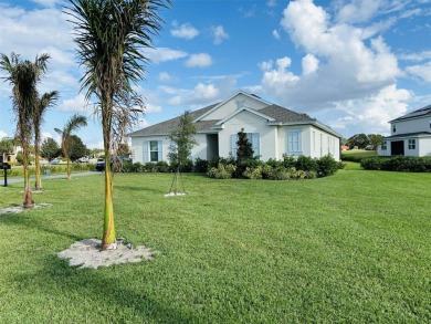 Welcome to this stunning home in the scenic, gated community of on Deer Island Country Club in Florida - for sale on GolfHomes.com, golf home, golf lot