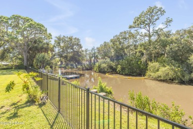 Canal-front gem is a rare find that promises the lifestyle on Hidden Lakes Golf Club in Florida - for sale on GolfHomes.com, golf home, golf lot
