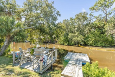 Canal-front gem is a rare find that promises the lifestyle on Hidden Lakes Golf Club in Florida - for sale on GolfHomes.com, golf home, golf lot