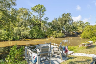 Canal-front gem is a rare find that promises the lifestyle on Hidden Lakes Golf Club in Florida - for sale on GolfHomes.com, golf home, golf lot