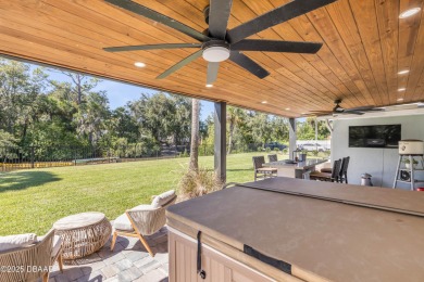 Canal-front gem is a rare find that promises the lifestyle on Hidden Lakes Golf Club in Florida - for sale on GolfHomes.com, golf home, golf lot