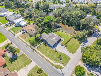 Canal-front gem is a rare find that promises the lifestyle on Hidden Lakes Golf Club in Florida - for sale on GolfHomes.com, golf home, golf lot