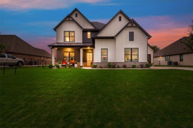 Stunning 4 bed, 3.5 bath home located in the 24-7 gated & on The Golf Club at Resort Eagle Mountain Lake in Texas - for sale on GolfHomes.com, golf home, golf lot