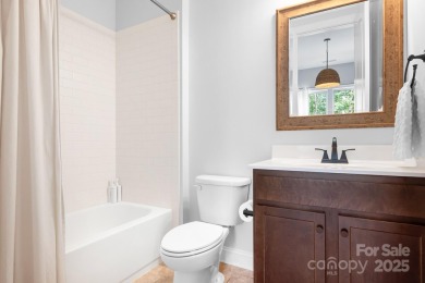 This exquisite home offers a unique blend of warm living spaces on Skybrook Golf Club in North Carolina - for sale on GolfHomes.com, golf home, golf lot