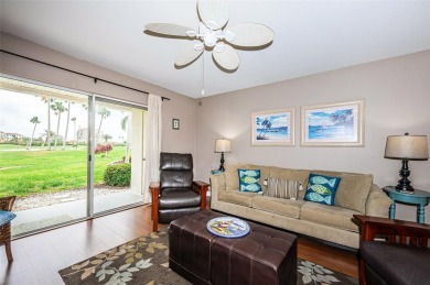 This ground-floor condo with 2 bedrooms and 2 bathrooms embodies on Isla Del Sol Yacht and Country Club in Florida - for sale on GolfHomes.com, golf home, golf lot