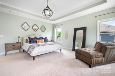 This exquisite home offers a unique blend of warm living spaces on Skybrook Golf Club in North Carolina - for sale on GolfHomes.com, golf home, golf lot