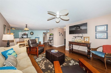 This ground-floor condo with 2 bedrooms and 2 bathrooms embodies on Isla Del Sol Yacht and Country Club in Florida - for sale on GolfHomes.com, golf home, golf lot