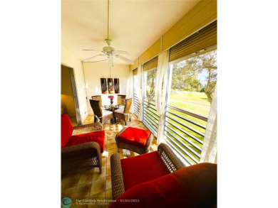 EXPANSIVE GOLF/WATER/CLUBHOUSE VIEW from this Favored LUXURY on Wynmoor Golf Course in Florida - for sale on GolfHomes.com, golf home, golf lot