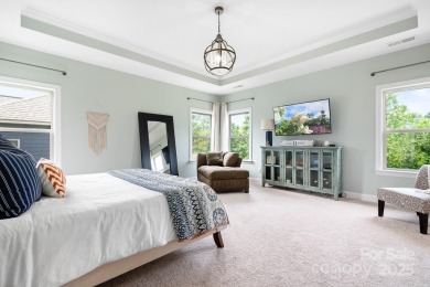 This exquisite home offers a unique blend of warm living spaces on Skybrook Golf Club in North Carolina - for sale on GolfHomes.com, golf home, golf lot