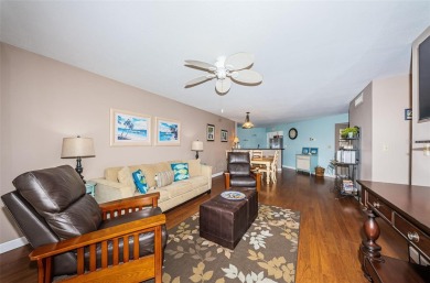 This ground-floor condo with 2 bedrooms and 2 bathrooms embodies on Isla Del Sol Yacht and Country Club in Florida - for sale on GolfHomes.com, golf home, golf lot