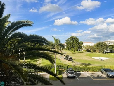 EXPANSIVE GOLF/WATER/CLUBHOUSE VIEW from this Favored LUXURY on Wynmoor Golf Course in Florida - for sale on GolfHomes.com, golf home, golf lot