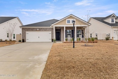 Welcome to the thoughtfully designed Litchfield II, a 3-bedroom on Brunswick Plantation and Golf Resorts in North Carolina - for sale on GolfHomes.com, golf home, golf lot