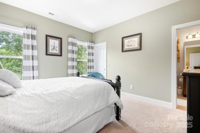 This exquisite home offers a unique blend of warm living spaces on Skybrook Golf Club in North Carolina - for sale on GolfHomes.com, golf home, golf lot