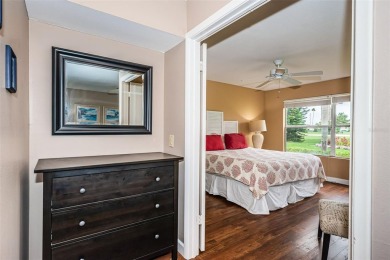 This ground-floor condo with 2 bedrooms and 2 bathrooms embodies on Isla Del Sol Yacht and Country Club in Florida - for sale on GolfHomes.com, golf home, golf lot