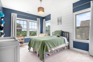 This exquisite home offers a unique blend of warm living spaces on Skybrook Golf Club in North Carolina - for sale on GolfHomes.com, golf home, golf lot