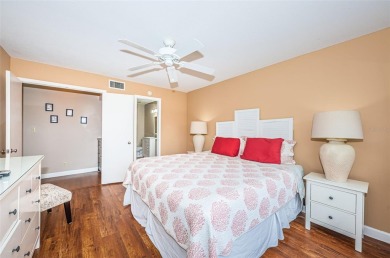 This ground-floor condo with 2 bedrooms and 2 bathrooms embodies on Isla Del Sol Yacht and Country Club in Florida - for sale on GolfHomes.com, golf home, golf lot