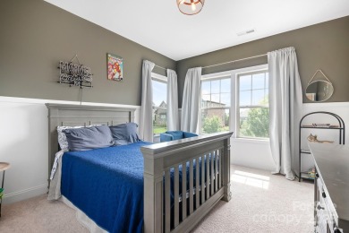 This exquisite home offers a unique blend of warm living spaces on Skybrook Golf Club in North Carolina - for sale on GolfHomes.com, golf home, golf lot
