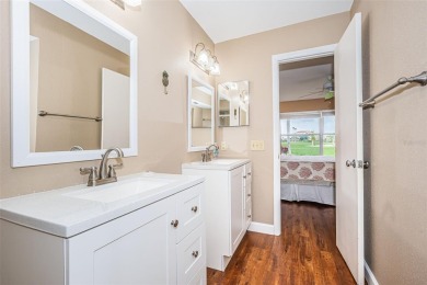 This ground-floor condo with 2 bedrooms and 2 bathrooms embodies on Isla Del Sol Yacht and Country Club in Florida - for sale on GolfHomes.com, golf home, golf lot
