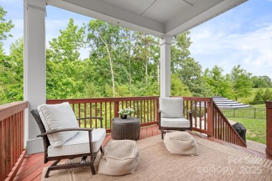 This exquisite home offers a unique blend of warm living spaces on Skybrook Golf Club in North Carolina - for sale on GolfHomes.com, golf home, golf lot