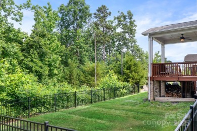 This exquisite home offers a unique blend of warm living spaces on Skybrook Golf Club in North Carolina - for sale on GolfHomes.com, golf home, golf lot