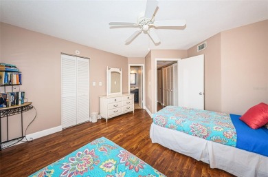 This ground-floor condo with 2 bedrooms and 2 bathrooms embodies on Isla Del Sol Yacht and Country Club in Florida - for sale on GolfHomes.com, golf home, golf lot