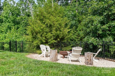 This exquisite home offers a unique blend of warm living spaces on Skybrook Golf Club in North Carolina - for sale on GolfHomes.com, golf home, golf lot