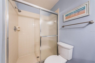 This ground-floor condo with 2 bedrooms and 2 bathrooms embodies on Isla Del Sol Yacht and Country Club in Florida - for sale on GolfHomes.com, golf home, golf lot