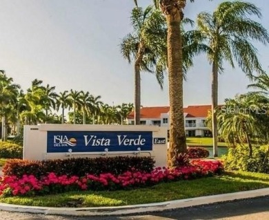 This ground-floor condo with 2 bedrooms and 2 bathrooms embodies on Isla Del Sol Yacht and Country Club in Florida - for sale on GolfHomes.com, golf home, golf lot
