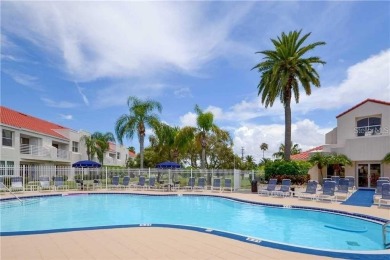 This ground-floor condo with 2 bedrooms and 2 bathrooms embodies on Isla Del Sol Yacht and Country Club in Florida - for sale on GolfHomes.com, golf home, golf lot