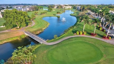 EXPANSIVE GOLF/WATER/CLUBHOUSE VIEW from this Favored LUXURY on Wynmoor Golf Course in Florida - for sale on GolfHomes.com, golf home, golf lot