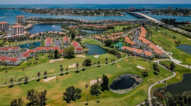 This ground-floor condo with 2 bedrooms and 2 bathrooms embodies on Isla Del Sol Yacht and Country Club in Florida - for sale on GolfHomes.com, golf home, golf lot