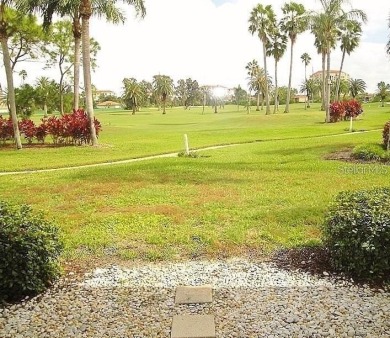 This ground-floor condo with 2 bedrooms and 2 bathrooms embodies on Isla Del Sol Yacht and Country Club in Florida - for sale on GolfHomes.com, golf home, golf lot