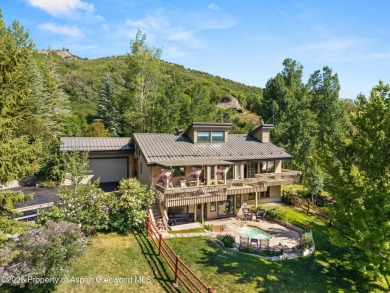 100 Terrace Lane is distinguished by its rare blend of privacy on The Snowmass Club in Colorado - for sale on GolfHomes.com, golf home, golf lot