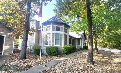 This beautifully made home right on the golf course is a on Holiday Island Golf Course in Arkansas - for sale on GolfHomes.com, golf home, golf lot