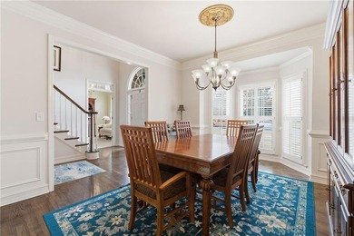 This three-sided brick traditional beauty delivers space, style on Polo Golf and Country Club in Georgia - for sale on GolfHomes.com, golf home, golf lot