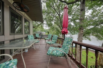 Nestled in the serene community of Hideaway Lake, this charming on Hide-A-Way Lake Golf Course in Texas - for sale on GolfHomes.com, golf home, golf lot